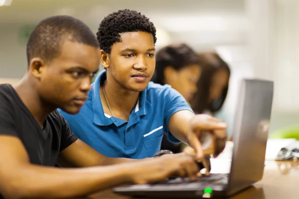 depositphotos_20130719 stock photo african college students using laptop